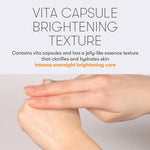 A hand applies Vita-Light Reedle Shot 100, a clear, jelly-like Vitamin C skincare product, to the back of another hand. Text highlights its Vita Capsule Brightening Texture for overnight radiance and deep moisturising.